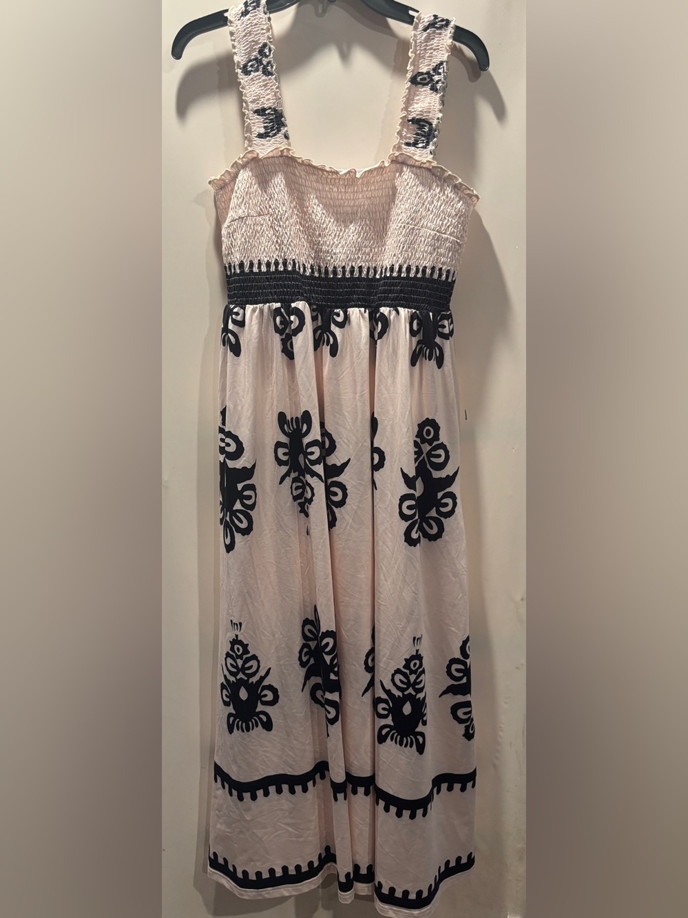 Boho Sleeveless Smocked Midi Dress with Black Floral Embroidery